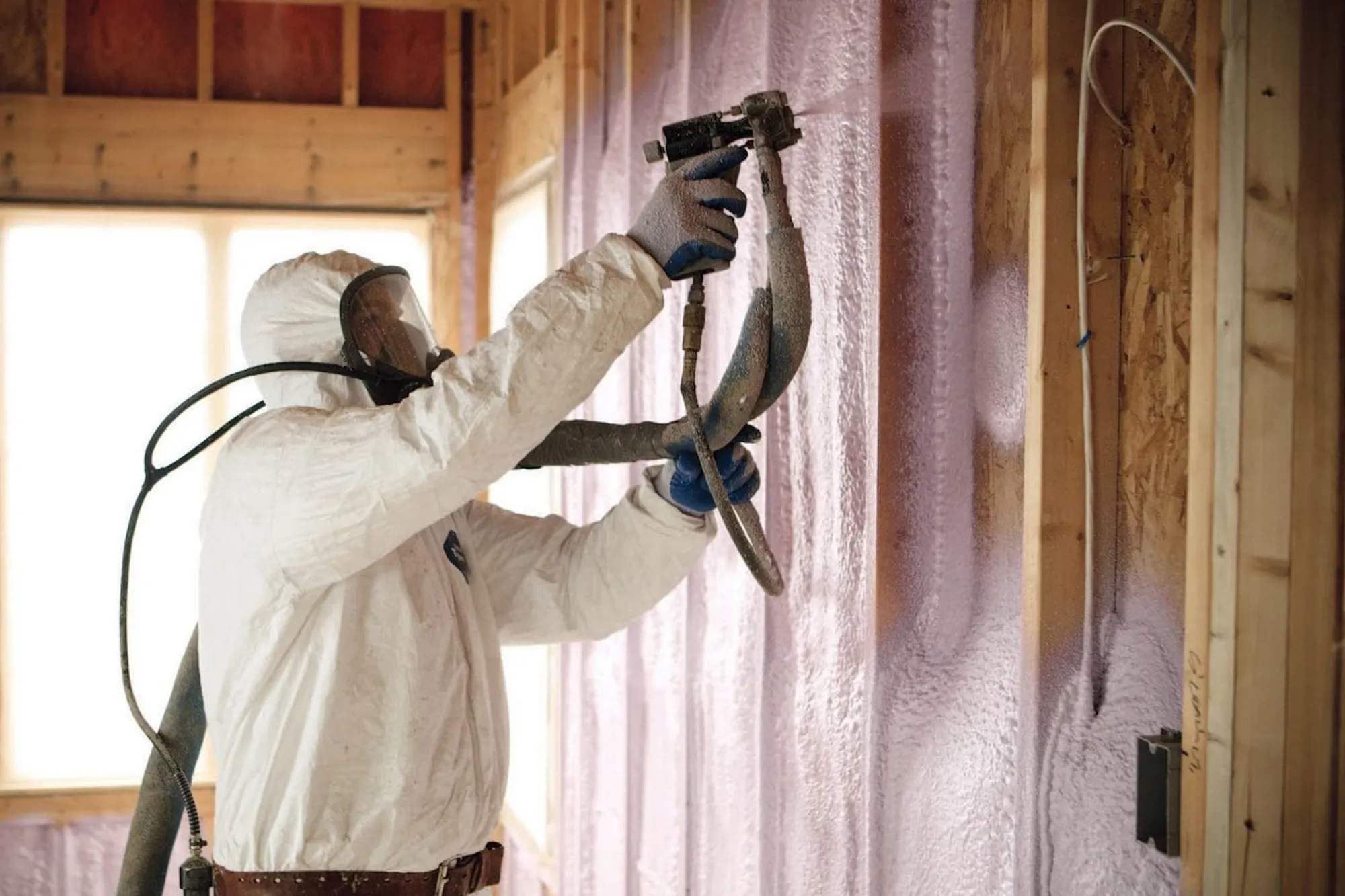 Closed-cell spray foam applied inside an Alaska metal building
